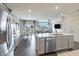Kitchen with island, stainless steel appliances, and views to the living room at 18655 Moray St, Westfield, IN 46069