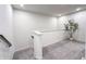 Bright landing area with gray carpeting and a potted plant at 18655 Moray St, Westfield, IN 46069