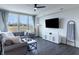 Relaxing living room with sectional sofa, large TV and plenty of natural light at 18655 Moray St, Westfield, IN 46069