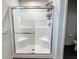 Large walk-in shower with sliding glass door and built-in shelving at 18655 Moray St, Westfield, IN 46069