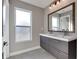 Bathroom with double vanity and large mirror at 2009 Carrollton Ave, Indianapolis, IN 46202