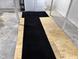 Partially finished basement with new flooring and mats at 2317 Fowler St, Anderson, IN 46012