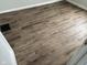 New wood-look flooring in bedroom at 2317 Fowler St, Anderson, IN 46012