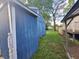 This image captures a side view of the house, including exterior walls and landscaping at 2317 Fowler St, Anderson, IN 46012