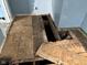 Damaged wood flooring needing repair or replacement at 2317 Fowler St, Anderson, IN 46012