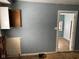 Kitchen with gray walls and wood cabinet at 2317 Fowler St, Anderson, IN 46012