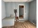 Unfinished room with exposed electrical and plumbing at 2317 Fowler St, Anderson, IN 46012