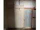 Unfinished room with a door and shelving at 2317 Fowler St, Anderson, IN 46012