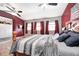 Comfortable bedroom featuring a bed, natural light, and an American flag at 233 S Routiers Ave, Indianapolis, IN 46219