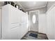 Bright entryway with white cabinets and wood flooring at 233 S Routiers Ave, Indianapolis, IN 46219