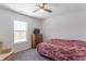 Relaxing bedroom with a comfortable bed and ceiling fan at 2406 Ninebark Dr, Plainfield, IN 46168