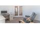 Bright office space with french doors and a comfortable recliner at 2406 Ninebark Dr, Plainfield, IN 46168