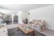 Open living room with view into kitchen and dining area at 2406 Ninebark Dr, Plainfield, IN 46168