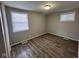 Bright bedroom with wood-look floors and neutral walls at 2442 Asbury St, Indianapolis, IN 46203