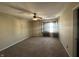 Well-lit bedroom with carpet and ceiling fan at 2507 Redland Ln, Indianapolis, IN 46217