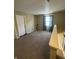 Spacious loft area with carpet and window at 2507 Redland Ln, Indianapolis, IN 46217