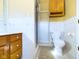 Clean bathroom with shower, toilet and wood vanity at 2509 W Euclid Ave, Muncie, IN 47304