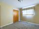Bright bedroom with neutral walls and carpeting at 2509 W Euclid Ave, Muncie, IN 47304