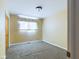 Simple bedroom with neutral walls and carpeting at 2509 W Euclid Ave, Muncie, IN 47304
