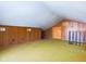 Bonus room with wood paneling and carpeting at 2509 W Euclid Ave, Muncie, IN 47304