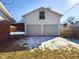 Two-car detached garage with single window and snow-covered ground at 2509 W Euclid Ave, Muncie, IN 47304