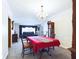 Bright dining room with chandelier and red tablecloth at 2509 W Euclid Ave, Muncie, IN 47304