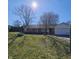 Charming single-story brick home with an attached garage and a well-maintained front lawn at 2509 W Euclid Ave, Muncie, IN 47304