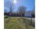Charming brick home with a well-maintained lawn on a sunny day at 2509 W Euclid Ave, Muncie, IN 47304