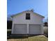 Spacious two-car garage with a window above the doors at 2509 W Euclid Ave, Muncie, IN 47304