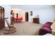 Spacious living room with hardwood floors, and a red table at 2509 W Euclid Ave, Muncie, IN 47304