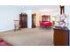 Living room features hardwood floors, and a red table at 2509 W Euclid Ave, Muncie, IN 47304