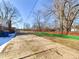 View of a residential street with construction barriers and snow at 2509 W Euclid Ave, Muncie, IN 47304