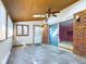 Sunroom features a ceiling fan, skylights, and sliding glass doors at 2509 W Euclid Ave, Muncie, IN 47304
