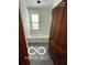 Updated bathroom with marble tile and bathtub at 340 W 11Th St, Anderson, IN 46016