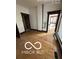 Small bathroom with shower/tub combo and checkered floor at 340 W 11Th St, Anderson, IN 46016