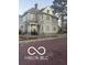 Classic two-story home with brick-paved street, offering a vintage charm that awaits restoration and personalization at 340 W 11Th St, Anderson, IN 46016