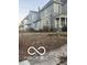 Two-story home with a backyard and traditional architecture, presenting an opportunity for renovation at 340 W 11Th St, Anderson, IN 46016