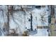 Overhead aerial shot of the home features the backyard, surrounding trees and neighborhood at 3647 Richelieu Rd, Indianapolis, IN 46226