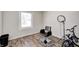 Bedroom with a chair and bike, offering a modern and adaptable living space at 3647 Richelieu Rd, Indianapolis, IN 46226