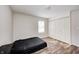 Spacious bedroom with modern flooring and a large closet offers ample storage at 3647 Richelieu Rd, Indianapolis, IN 46226