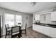 Bright eat-in kitchen features a cozy dining area and efficient layout at 3647 Richelieu Rd, Indianapolis, IN 46226