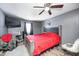 Comfortable main bedroom featuring neutral wall color, a ceiling fan, and a cozy atmosphere at 3647 Richelieu Rd, Indianapolis, IN 46226