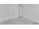 A modern bedroom featuring neutral walls, closet and plush gray carpeting at 385 N Post Oak Dr, Mooresville, IN 46158
