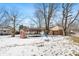 Large backyard with play structures and trampoline at 3909 S Lasalle St, Indianapolis, IN 46237