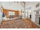 Cozy dining area with wood-paneled walls and a raised platform at 3909 S Lasalle St, Indianapolis, IN 46237
