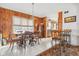 Classic dining room with wood table and chairs, and a kitchen view at 3909 S Lasalle St, Indianapolis, IN 46237