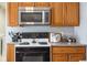 Well-equipped kitchen showcasing a microwave and range at 3909 S Lasalle St, Indianapolis, IN 46237