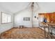 Large living room featuring a vaulted ceiling and stone fireplace at 3909 S Lasalle St, Indianapolis, IN 46237