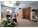 Bedroom with large closet and window, neutral color palette, and ceiling fan at 5419 E Shae Lake Dr, Mooresville, IN 46158