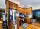 Updated kitchen with stainless steel appliances and oak cabinetry at 5419 E Shae Lake Dr, Mooresville, IN 46158